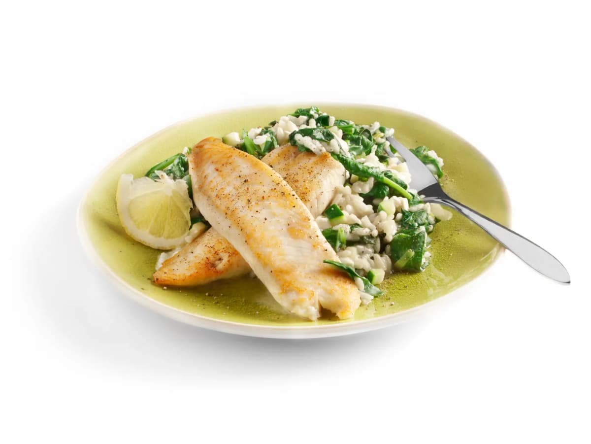 Tilapia met spinazie- risotto en geitenkaas