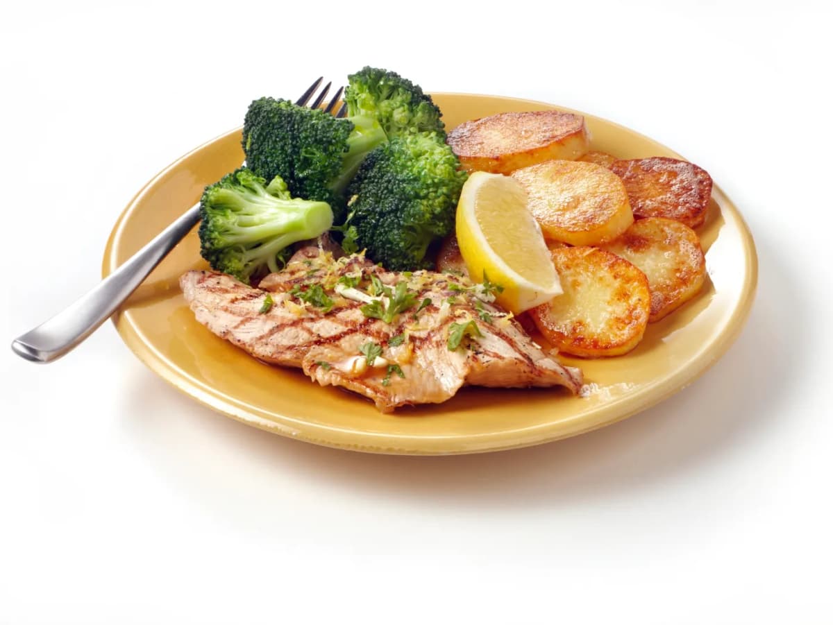 Geroosterde varkensfilet met sinaasappel en broccoli