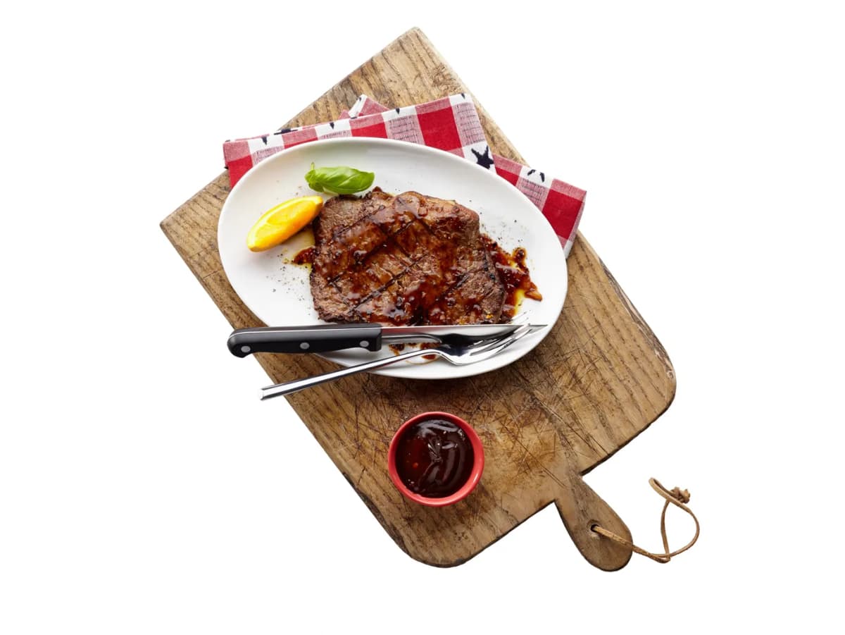 Ribeye met sinaasappel en sjalotjes